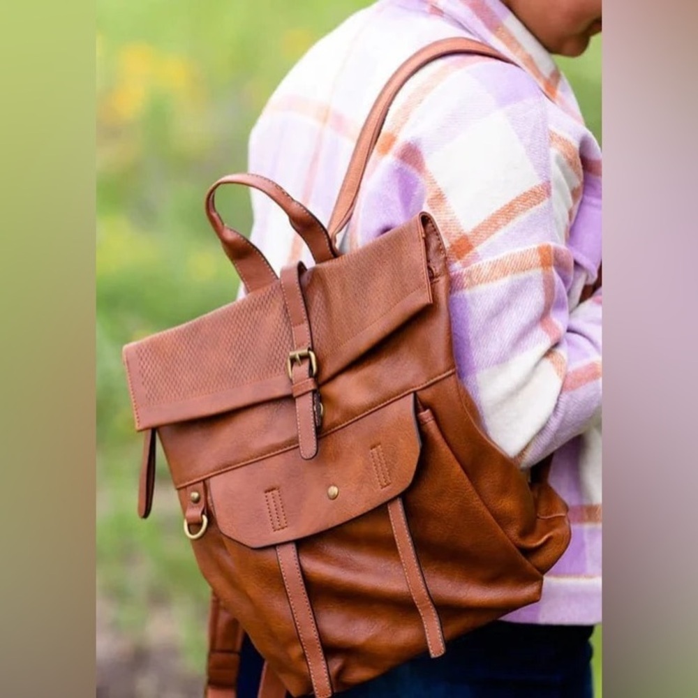 VEGAN LEATHER FOLD OVER BACK PACK. USED